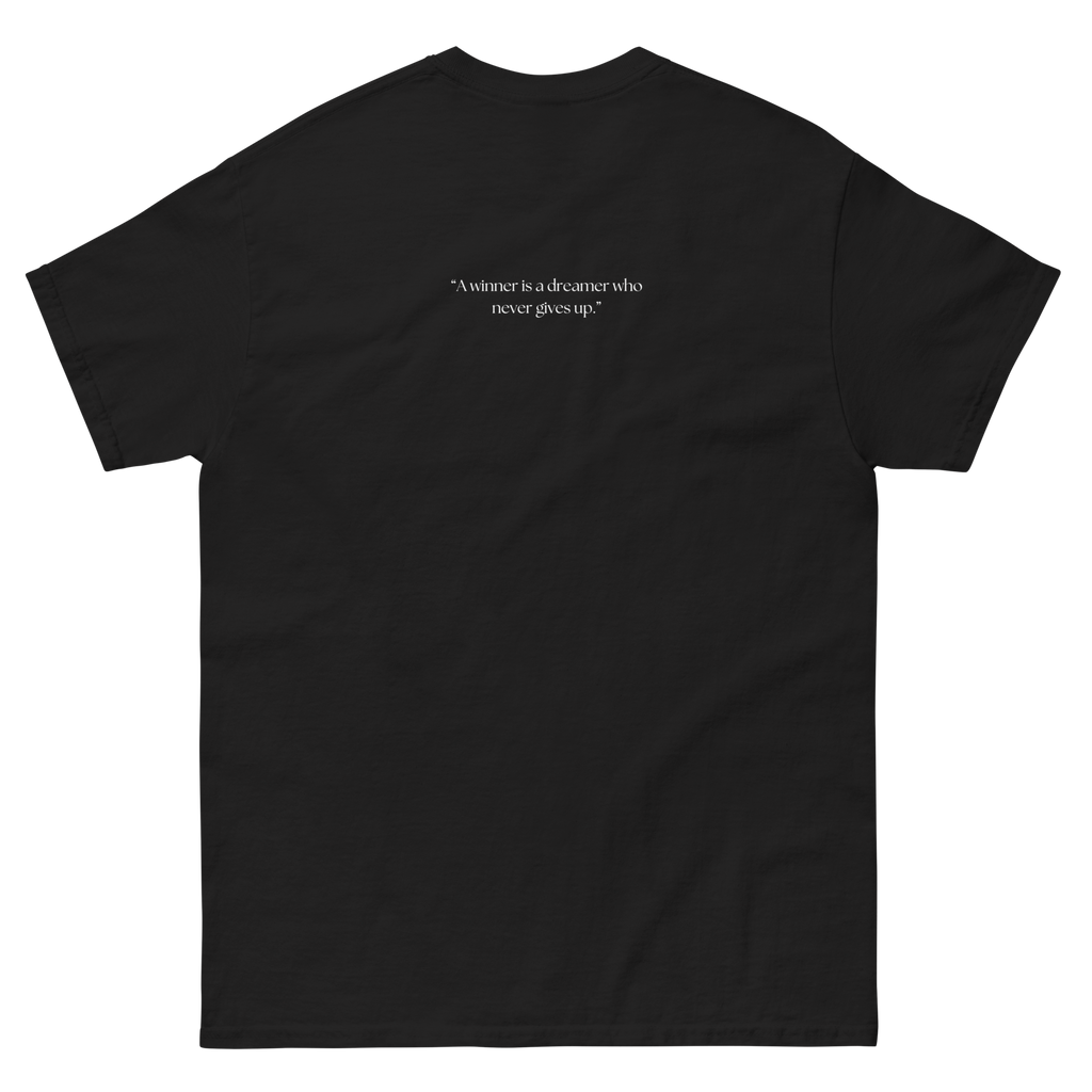"Black-shirt with white text that reads 'Addicted to the Dream.' The shirt features a stylish font and is perfect for casual wear. The design conveys a sense of passion and drive, making it a great choice for anyone who is focused on achieving their goals."