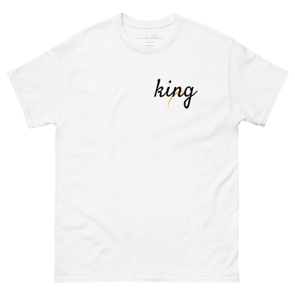 "Natural White t-shirt with white text that reads 'KING.' The shirt features a bold font and is perfect for making a statement. The design celebrates African heritage and identity, making it a great choice for anyone who is proud of their roots."
