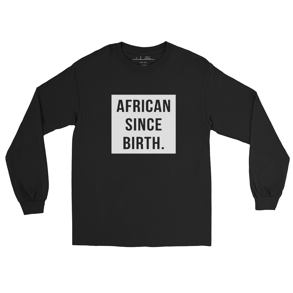 "Dark Black long sleeve t-shirt with white text that reads 'African Since Birth.' The shirt features a bold font and is perfect for making a statement. The design celebrates African heritage and identity, making it a great choice for anyone who is proud of their roots."