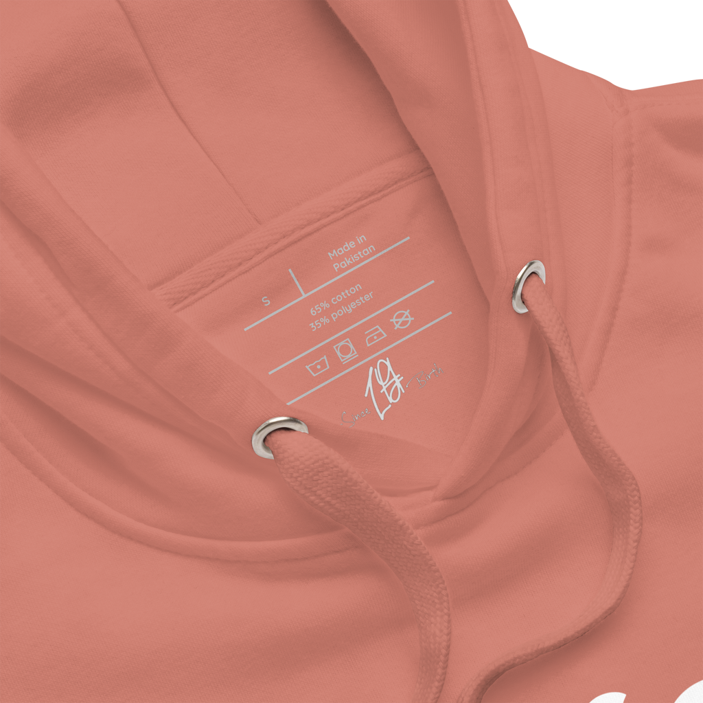 "Rose Pink hoodie with white text that reads 'Since Birth.' The hoodie features a stylish font and is perfect for casual wear. The design conveys a sense of passion and drive, making it a great choice for anyone who is focused on achieving their goals."